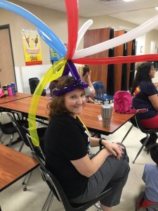 Mrs. McCreight with balloons on her head